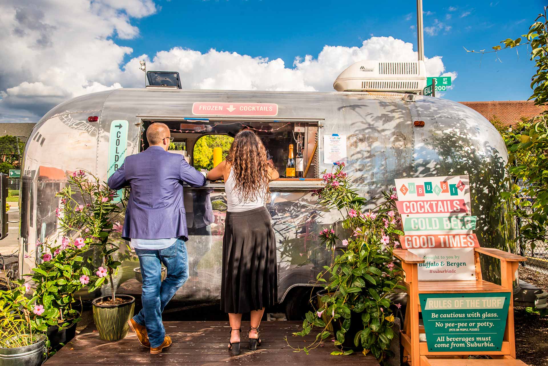vintage aluminum camper converted to outdoor bar at union market